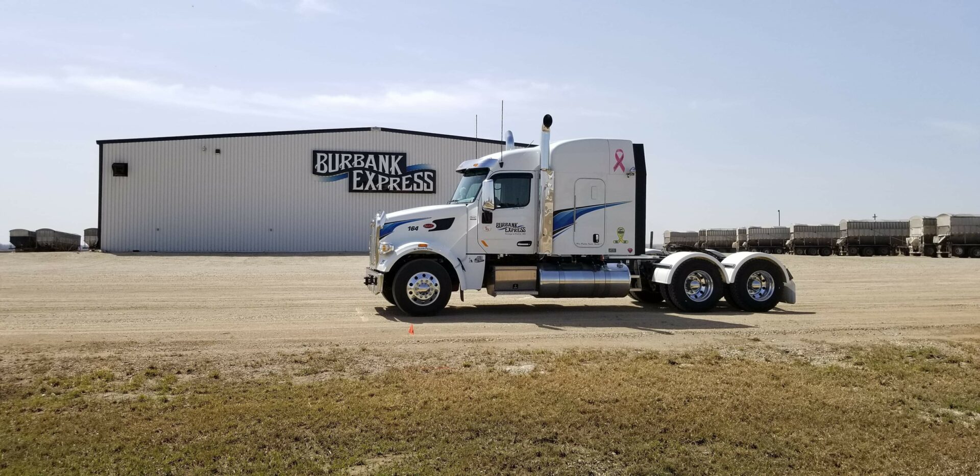 Burbank Express trailer in front of store